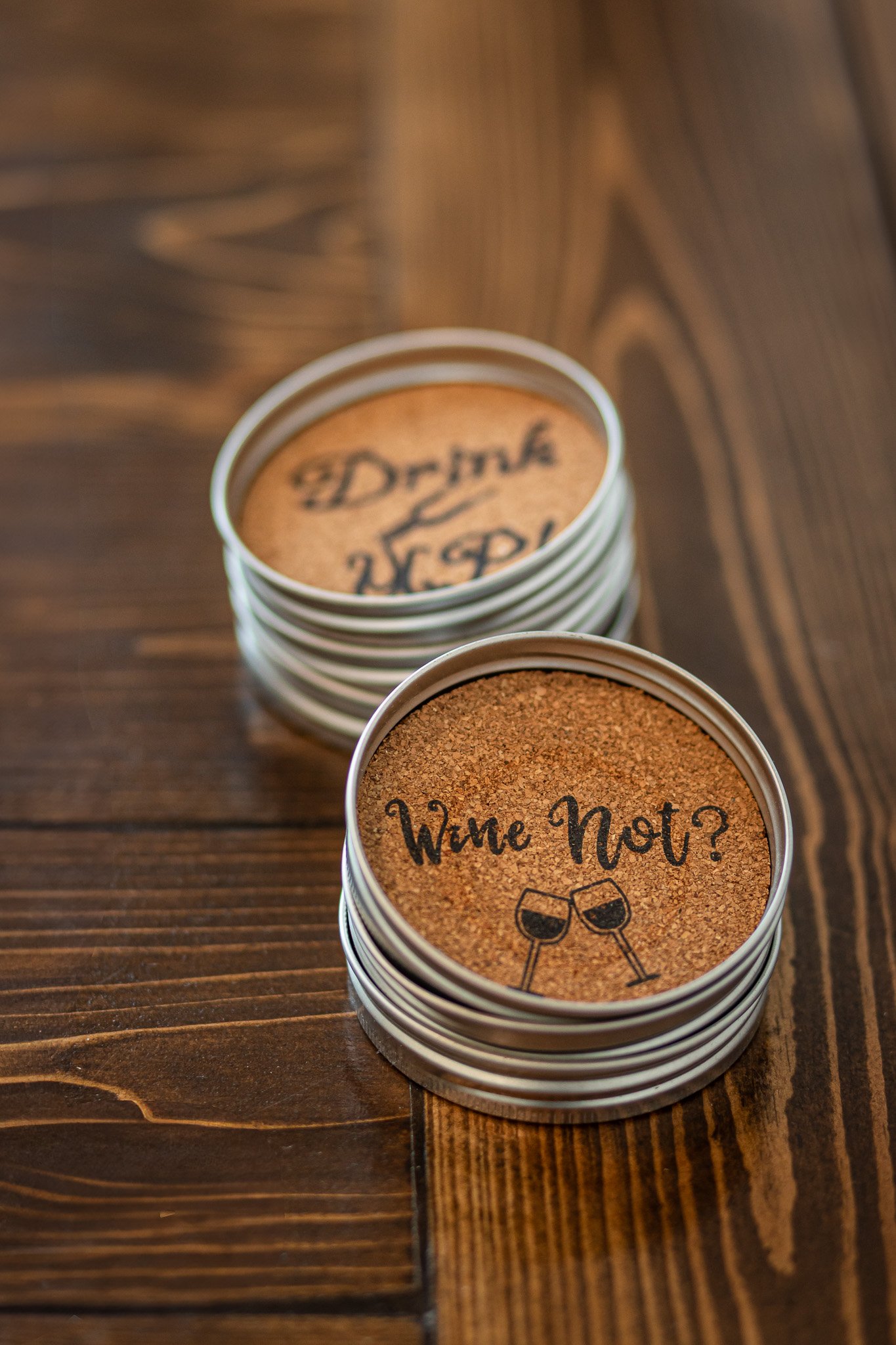 Close-up detail shot of decorative coasters on a wooden table