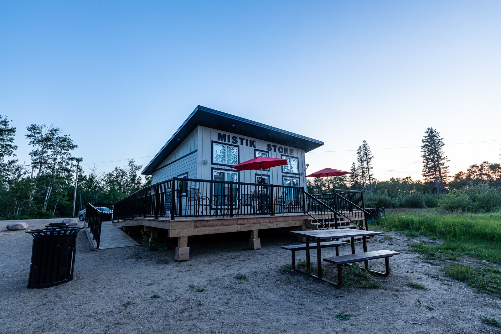 Mistik Resort store exterior at twilight
