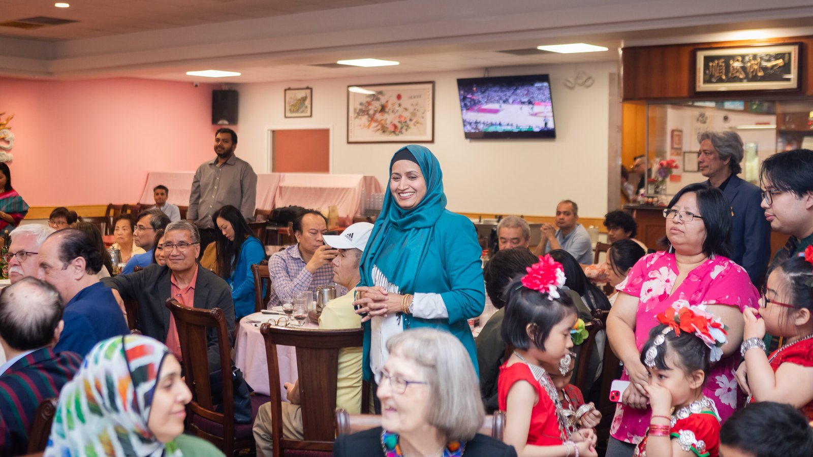 Guests at a community fundraiser dinner